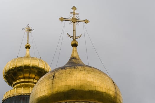 Two cupolas with orthodox crosses
