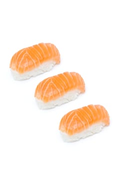 Delicious salmon nigiris isolated on white