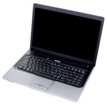 The old black laptop with the Russian keyboard on a white background