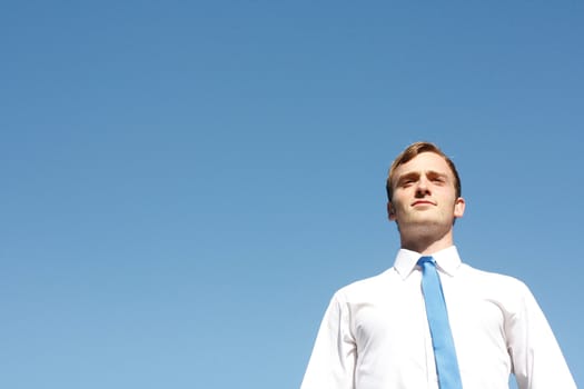 A business man and a blue background