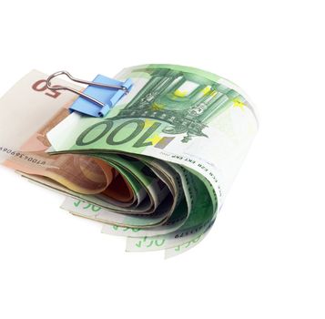 euro bills with paper clip on white background