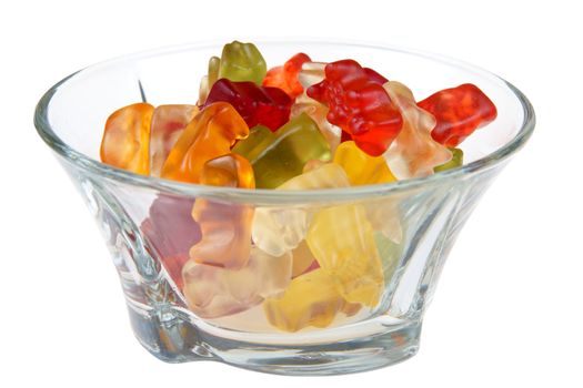 Gummy bears in glass bowl isolated on white background