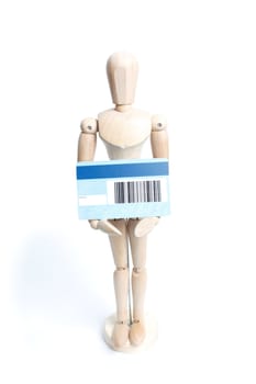 An artists mannequin with a credit card
