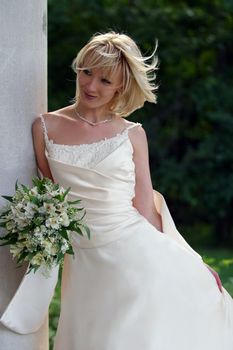 The beautiful bride with a bouquet 