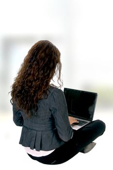 female busy with laptop on an abstract  background