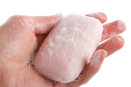 toilet soap with foam in woman's hand