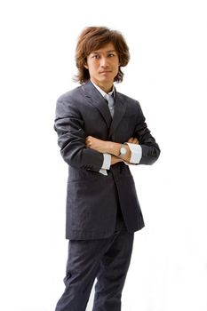 Young Asian business man dressed in a gray pinstripe suit with arms crossed, isolated