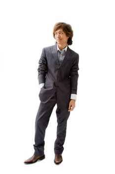 Young Asian business man dressed in a gray pinstripe suit with hand in pocket, isolated