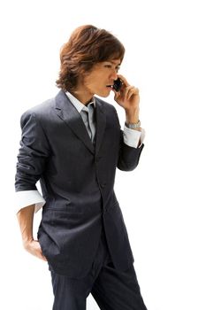 Young Asian business man with mobile phone calling, isolated