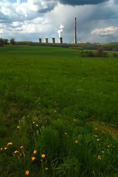 Landscape with cooling towers of power station.