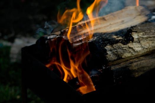 Fire at night. The beautiful fiery background