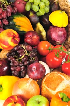 Colorful background of holiday harvest foods in a basket