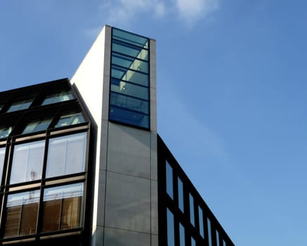 A photo of a modern styled office building.