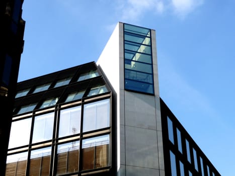 A photo of a modern styled office building.