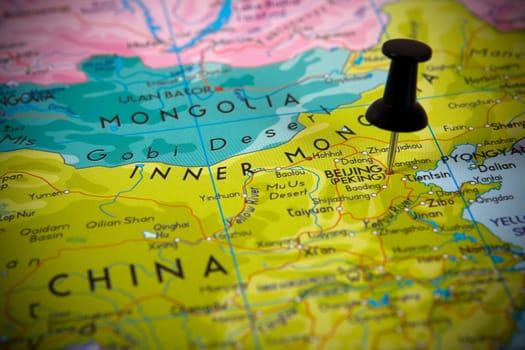 Small pin pointing on Beijing (China) in a map Asia.