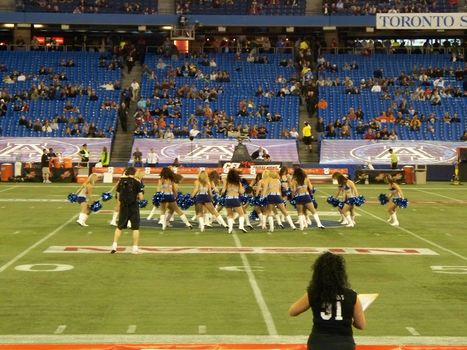 cheer leaders at football match 