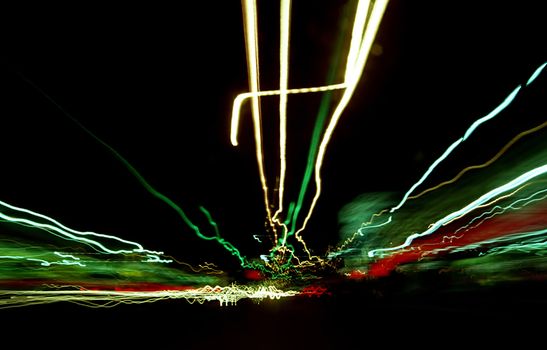 A long exposure of street lights while driving