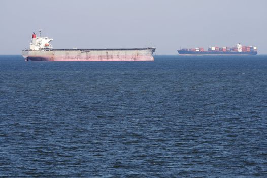 a picture of a cargo ship on water in transport