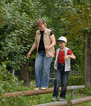 mother and boy outdoor sporting