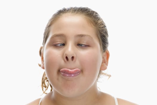 girl keep her tongue out on an isolated white background