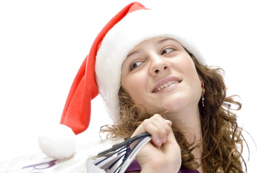 female with carry bags and santa cap on an isolated background