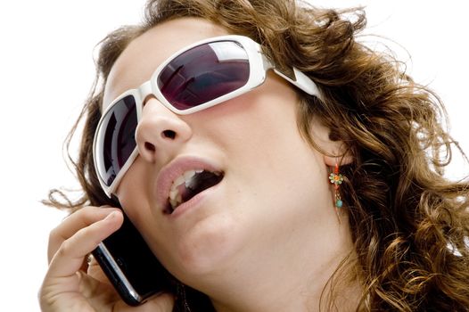 female talking on cell phone on an isolated background