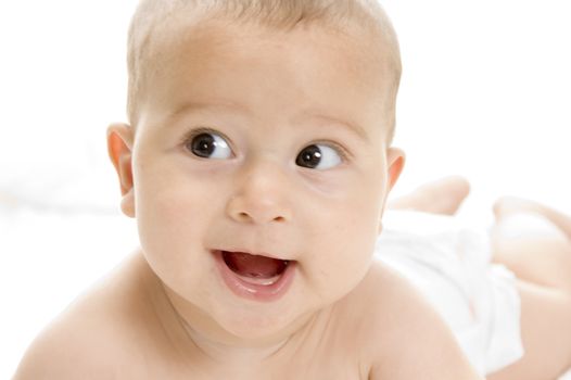 smiling baby lying with white background