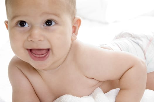 close up view of cute baby with white background