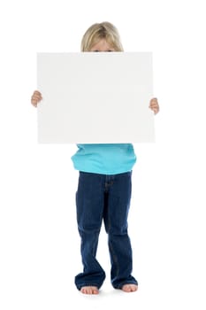 a little boy with a sign