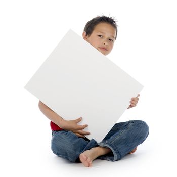 a young boy with a sign