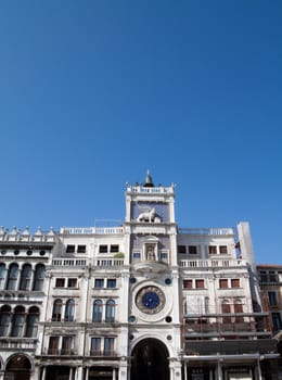 An old clock tower building in Venice, Italy