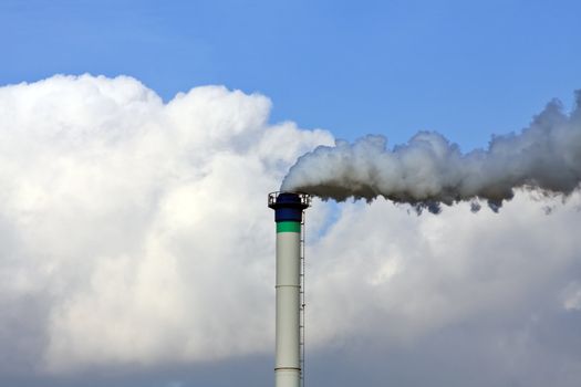 Chimney - Industry chimney smoking on blue sky background