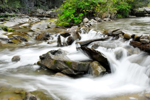 Waterfall - River in mountains great summer view