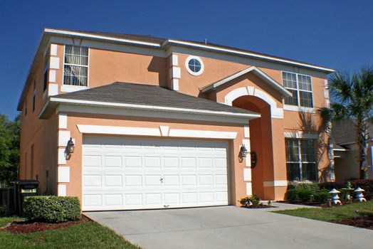 A front exterior of a large Florida home.