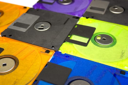 Background consisting of several diskettes of different colorA? Shallow DOF