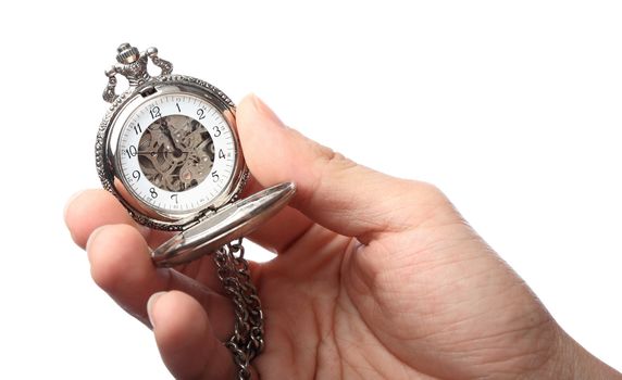 pocket watch hold by hand