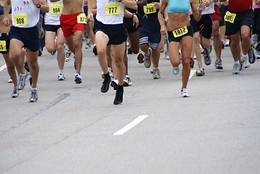 Big running race on foot during the day.                