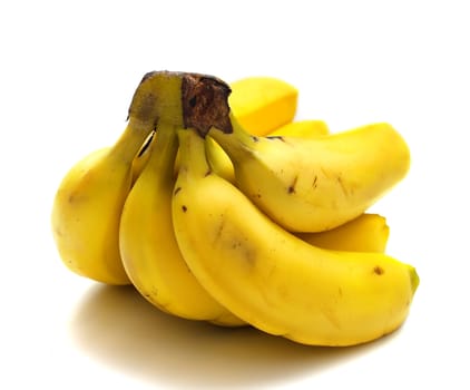 Ripe bananas on the white background. Shallow DOF