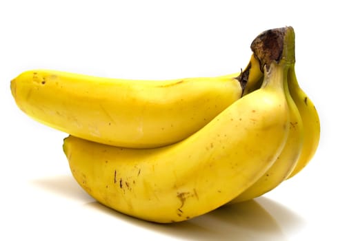 Ripe bananas on the white background. Shallow DOF