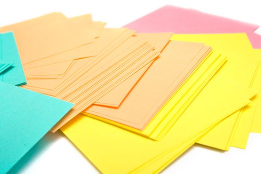 Pile of a pure paper for notes on a white background. Isolation, shallow DOF