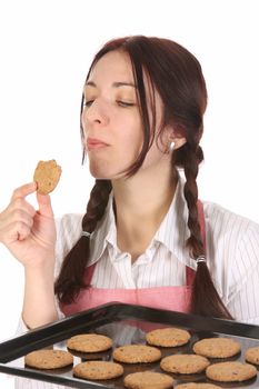 beautiful housewife eating a slice of chocolate cake 