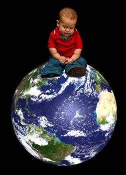 A young baby boy worried about our blue planet called Earth and it's future, sitting on our globe, isolated on a black background