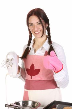 beautiful housewife with electric beater on white background