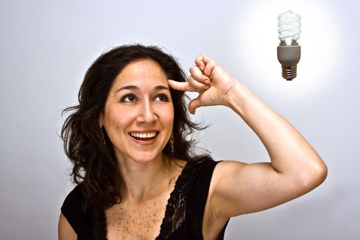 Woman having a brilliant environmentally friendly thought