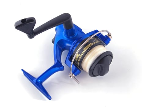 Fishing reel on a whitebackground