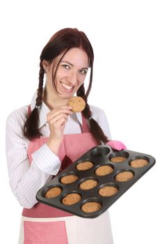 beautiful housewife eating a slice of chocolate cake 