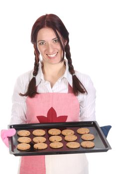 beautiful housewife showing off cakes on white background