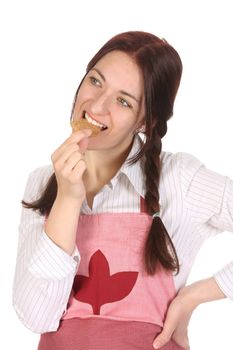 beautiful housewife eating a slice of chocolate cake 