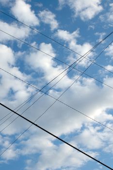 Wired blue sky with clouds - abstract modern background.