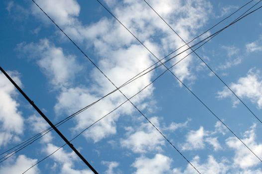 Wired blue sky with clouds - abstract modern background.